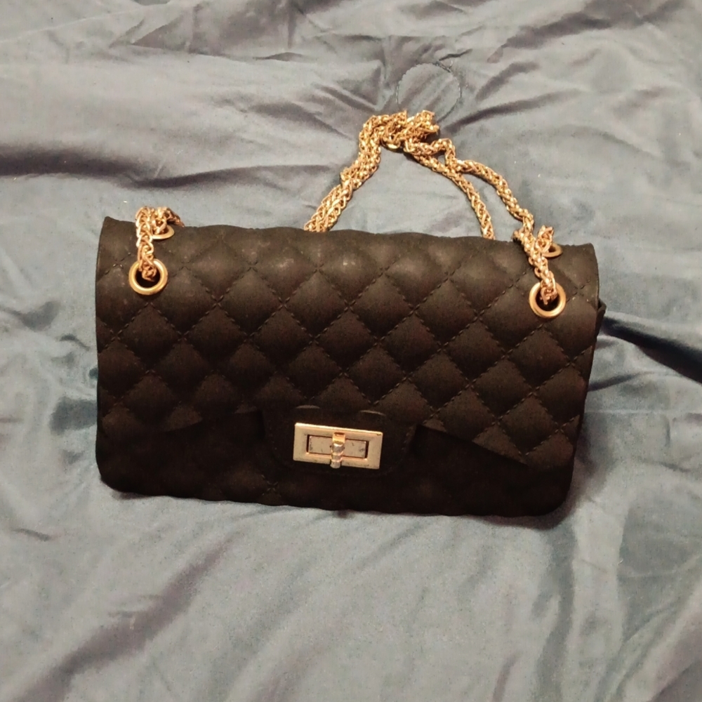 Women's purse with gold chain